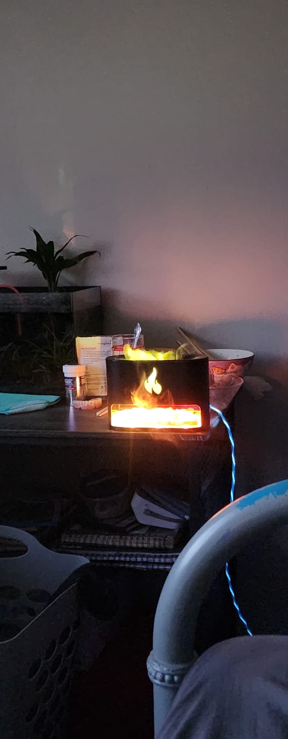 Customer photo review of Himalayan Salt Fireplace Humidifier Lamp + FREE 18 Organic Essential Oils Set