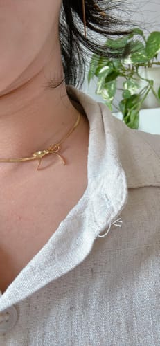Customer photo review of Bow Snake Chain Necklace