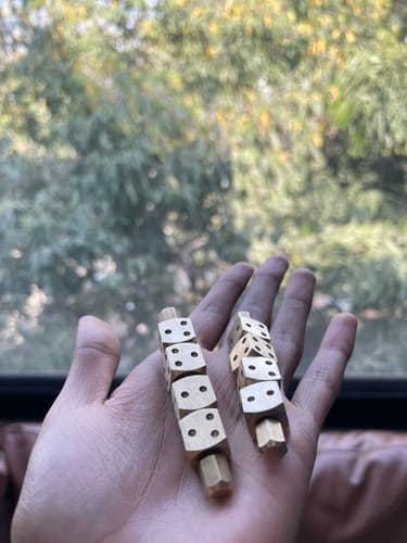 Customer photo review of Brass Ramal Pass Dice – Vastu Remedy for Divination & Spiritual Consulting | Ideal for Astrology Readings & Vastu Analysis | 8 cm x 1.4 cm x 1.4 cm | 200 g