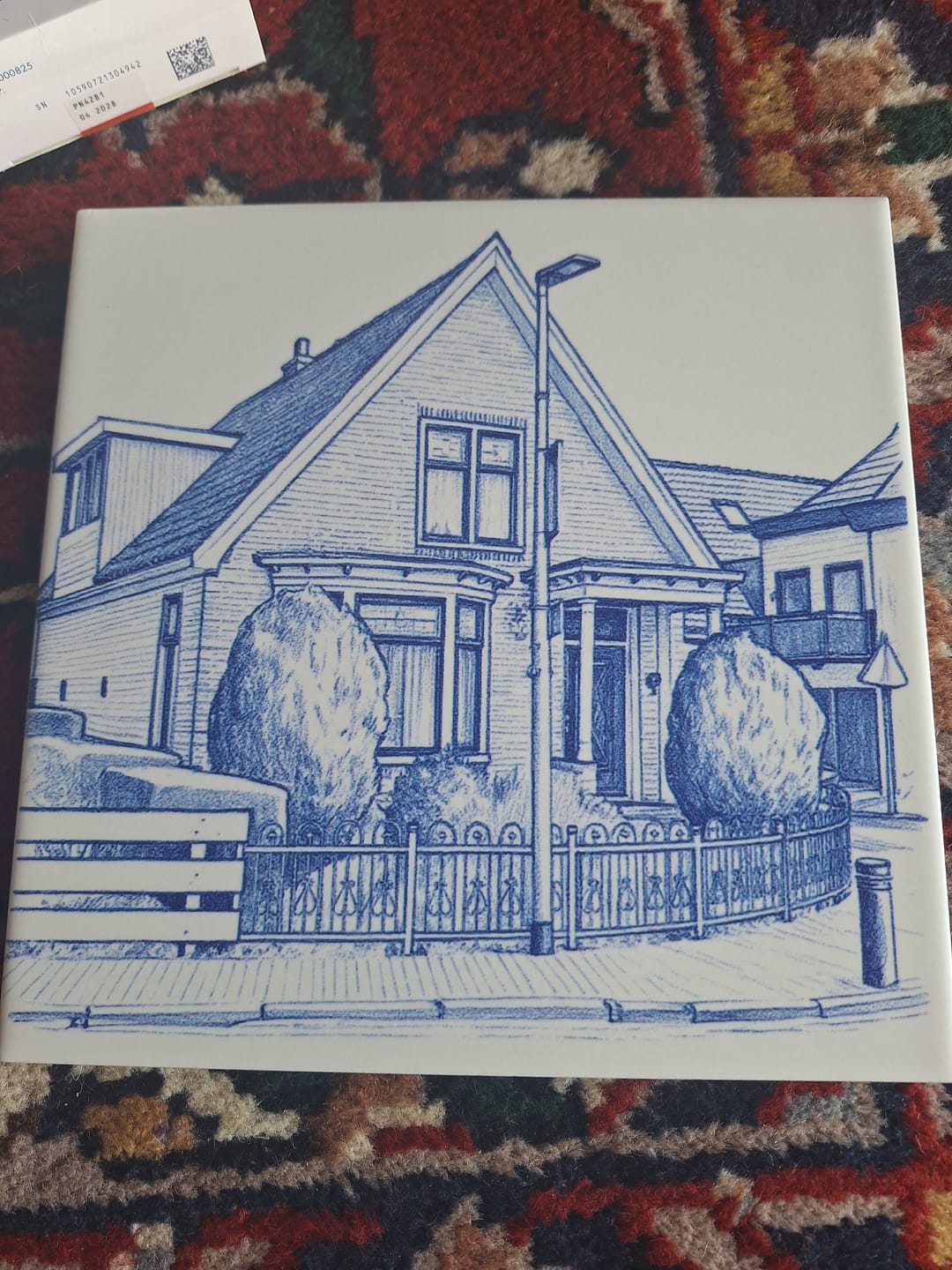 Customer photo review of Delfts Blauw tegeltje bedrukken met eigen huis