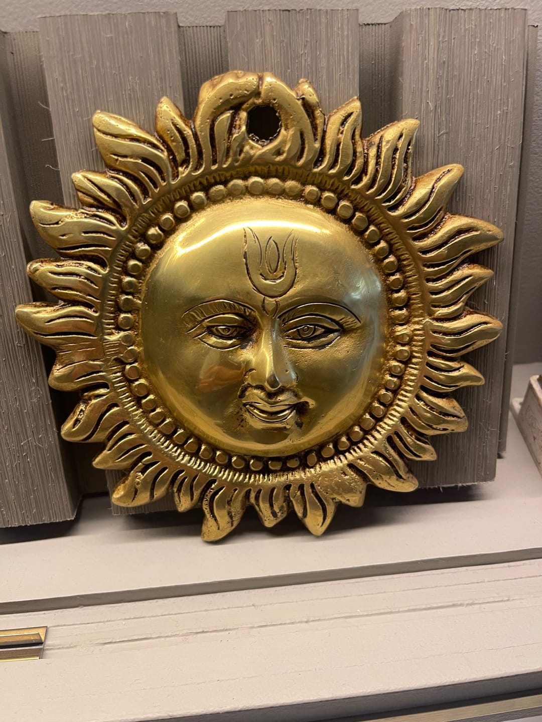 Customer photo review of Brass Vastu Sun Wall Hanging Idol Vastu Remedy for East Direction Balance, Fame and Positive Energy for Home, Office and Entrance Decor | 15 x 15 cm | 940 gm