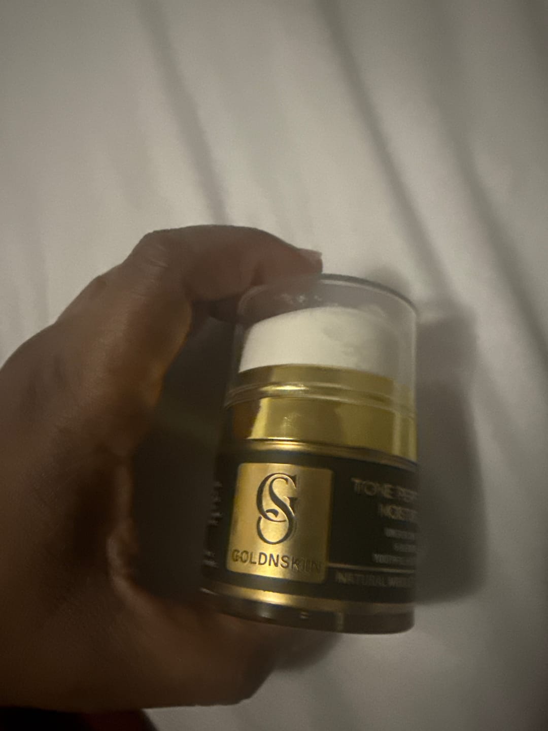 Customer photo review of Tone Perfecting Moisturizer