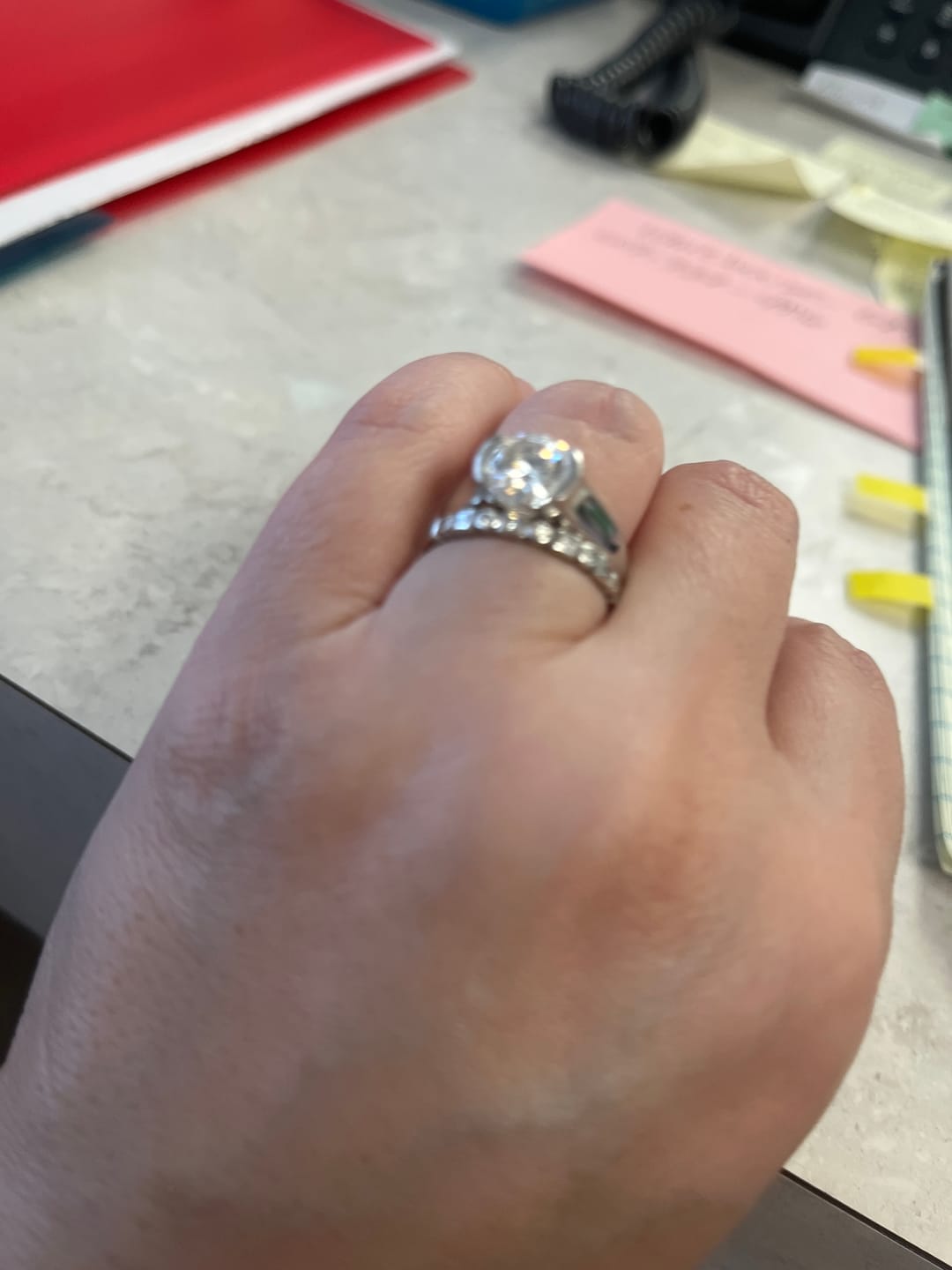 Customer photo review of Solitaire Moissanite Half Bezel Set Sterling Silver Engagement Ring