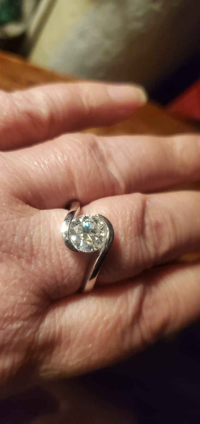 Customer photo review of Solitaire Tension Set Moissanite Bypass Engagement Ring