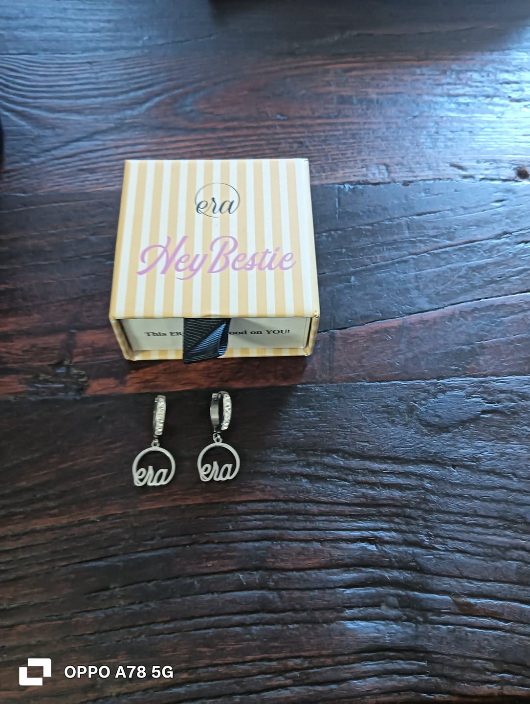 Customer photo review of Silver Precious Logo Earrings