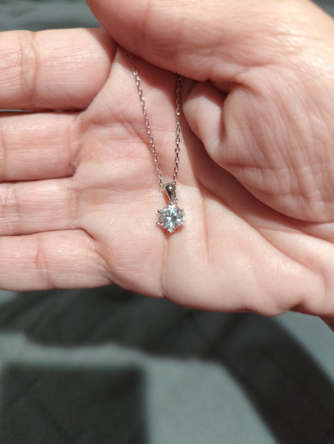 Customer photo review of Solitaire Moissanite Six-Prong Sterling Silver Necklace Pendant