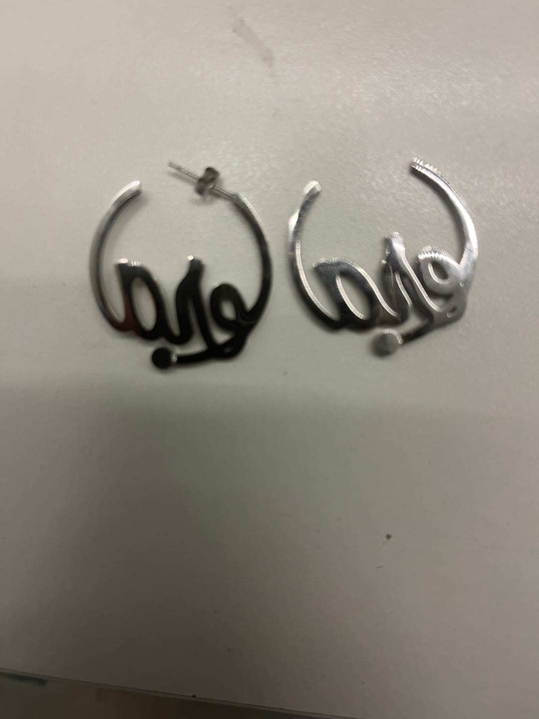 Customer photo review of Silver Era Logo Mini Hoops