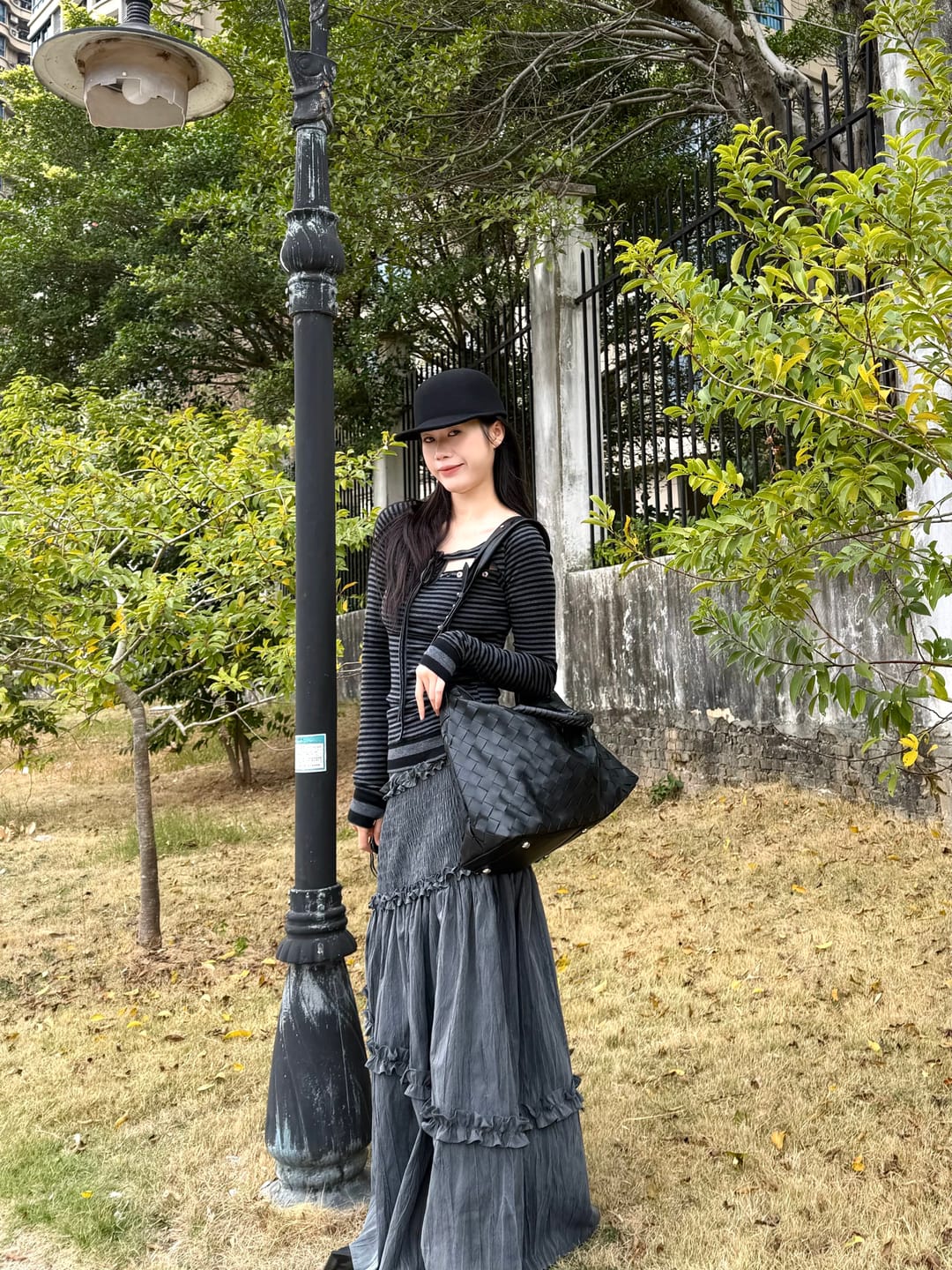 Customer photo review of DOINDULGE Asymmetric Smocked Maxi Skirt