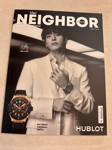 Customer's undamaged copy of The Neighbor magazine with Jung Kook on the black-and-white cover.