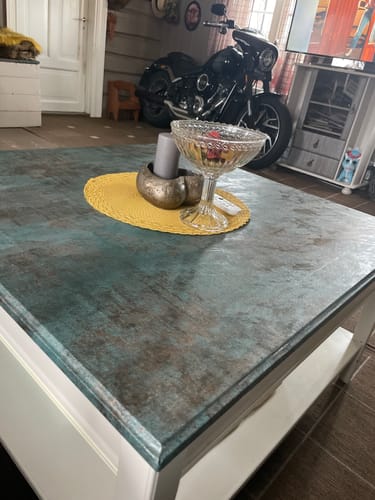 Kundens stuebord fornyet med dekorativ Oxide steel kontaktplast med et oksidert utseende.