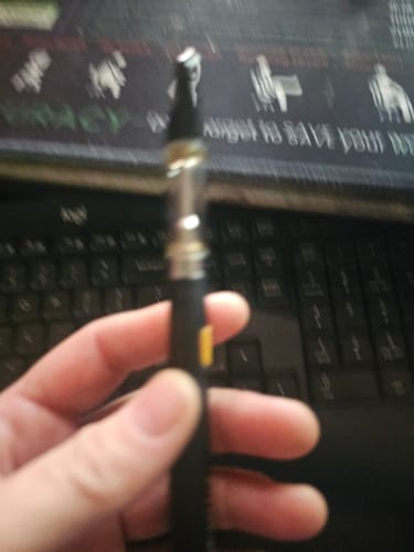 Customer photo review of 1 Gram Delta-8 THC Vape Cartridge | Strawberry Cheesecake - Indica