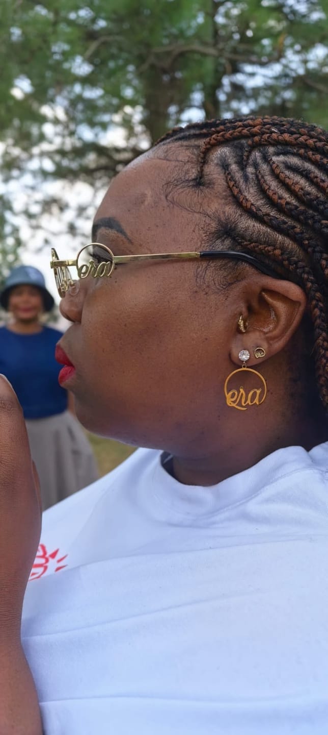 Customer photo review of Gold Luxe Mini Logo Hoops