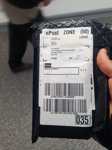 Customer holding the black shipping package containing their Gard Pro Ultra 3.