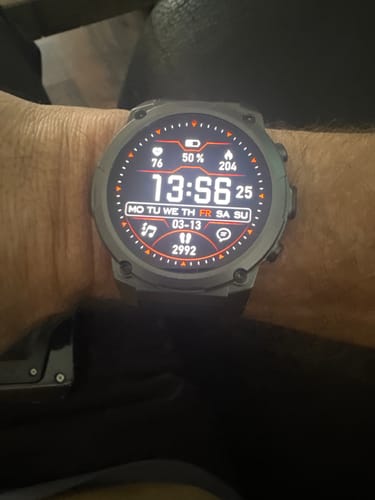 Customer's Gard Pro Ultra 3 smartwatch on their wrist, with the digital display showing 50% battery life.