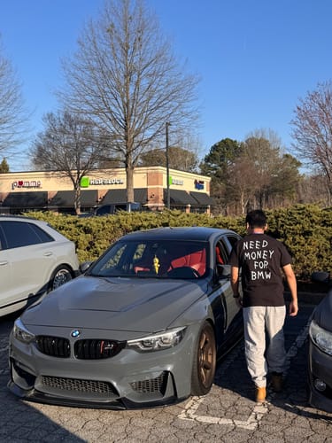 Customer photo review of NEED MONEY TEE