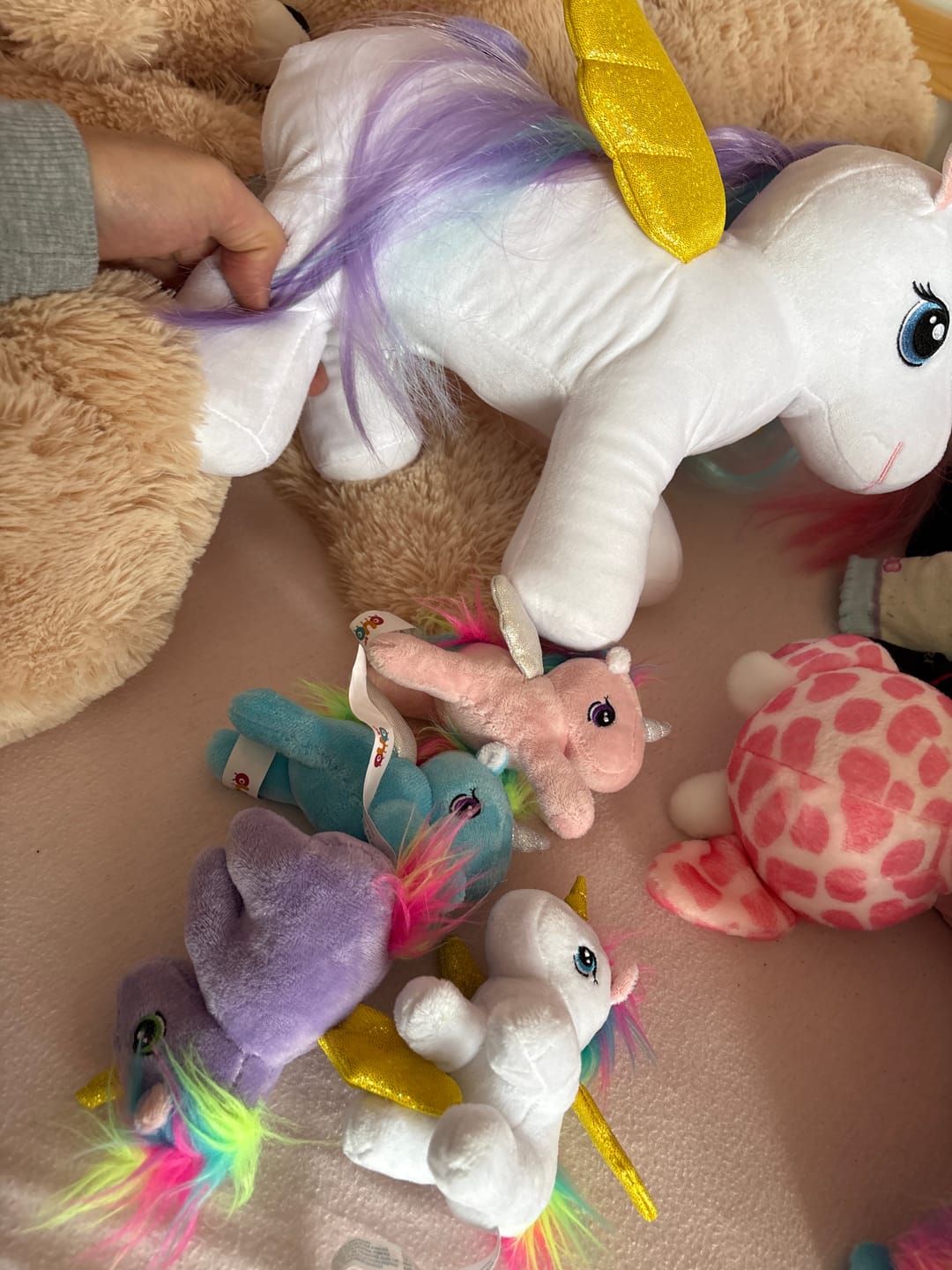 Customer photo review of Einhorn-Mama mit Regenbogenmähne und 4 Babys – Plüschfigur