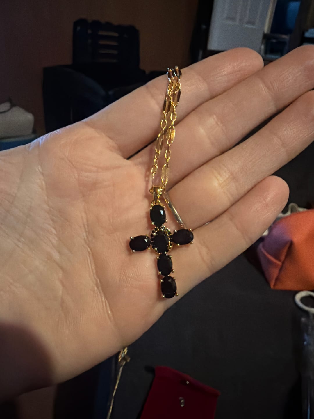 Customer photo review of Noir Cross Necklace