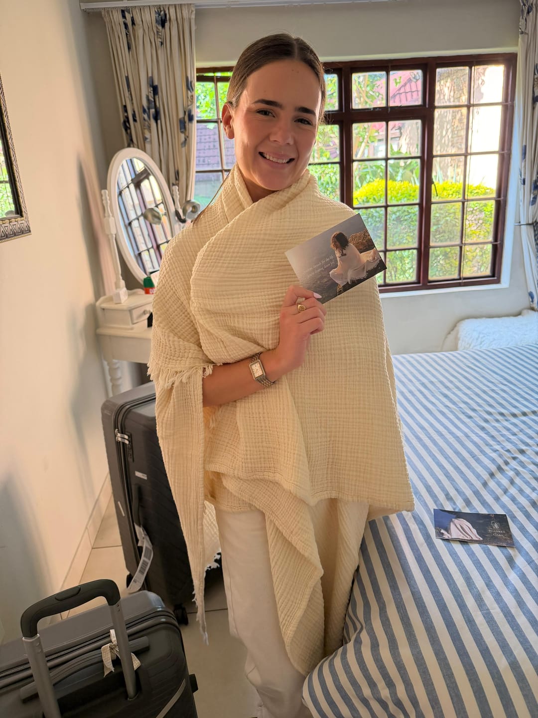 Customer photo review of Cream Swaddle Blanket (Single)