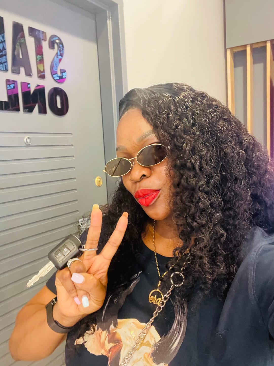 Customer photo review of Muse Logo Sunglasses – Gold Edition