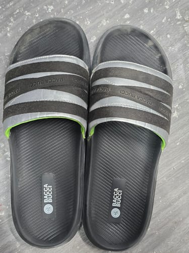 Customer's pair of black Bacca Bucci Galaxy Slides, showing the triple-stripe design on the straps.