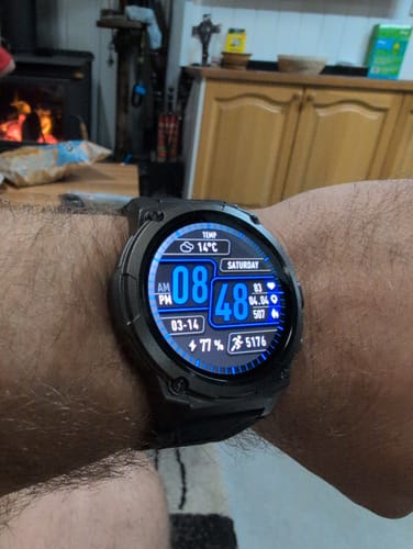 Customer's Gard Pro Ultra 3 watch on their wrist, with the detailed digital face lit up in blue.