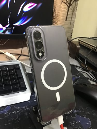 Customer showing the back of a One Plus NORD 5 in a clear Magsafe case with its white magnetic ring.