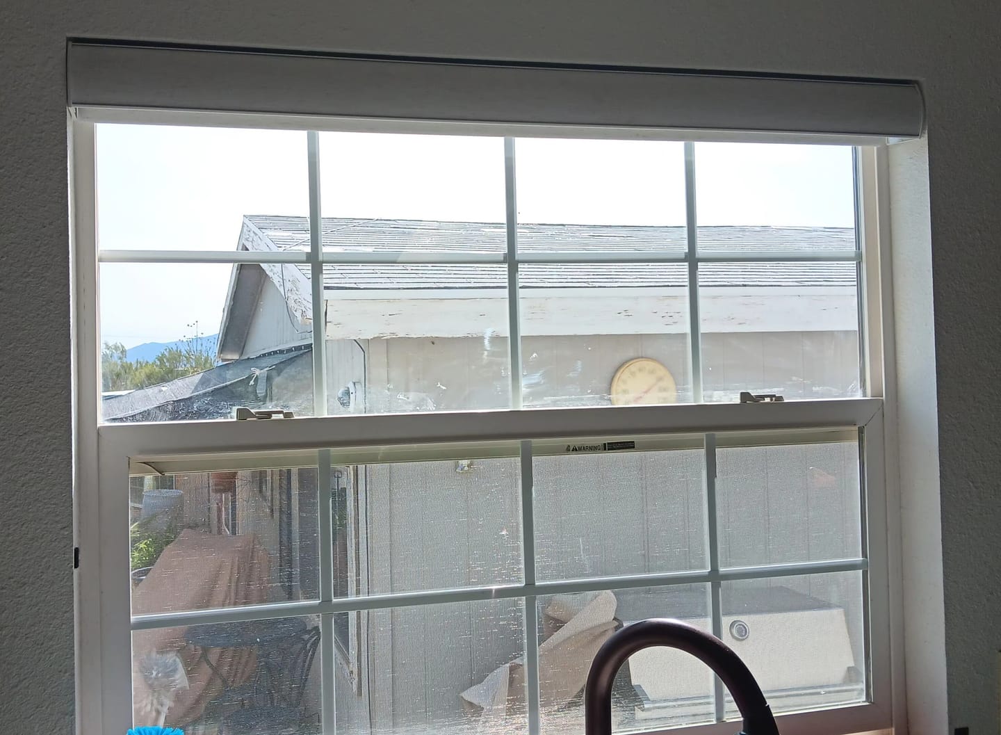 Customer photo review of SmartWings Motorized Roller Shades 100% Blackout Linen