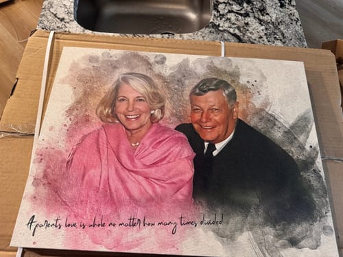 Customer's personalized photo painting of a smiling couple with a watercolor effect, ordered as a memorial gift.