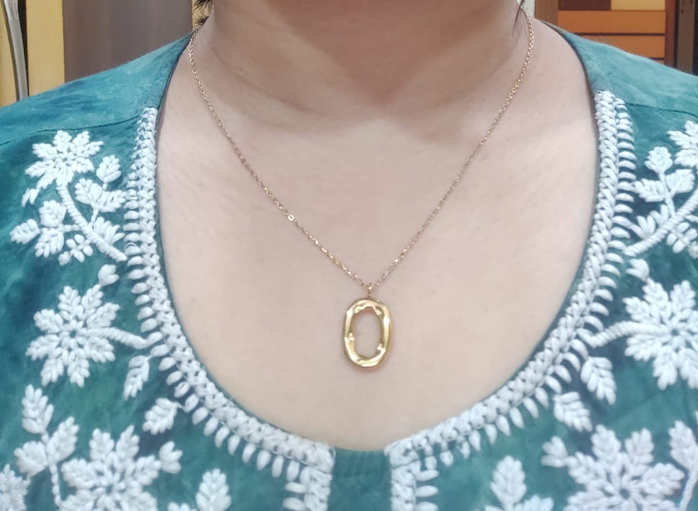 Customer photo review of Wobbly Oval Necklace