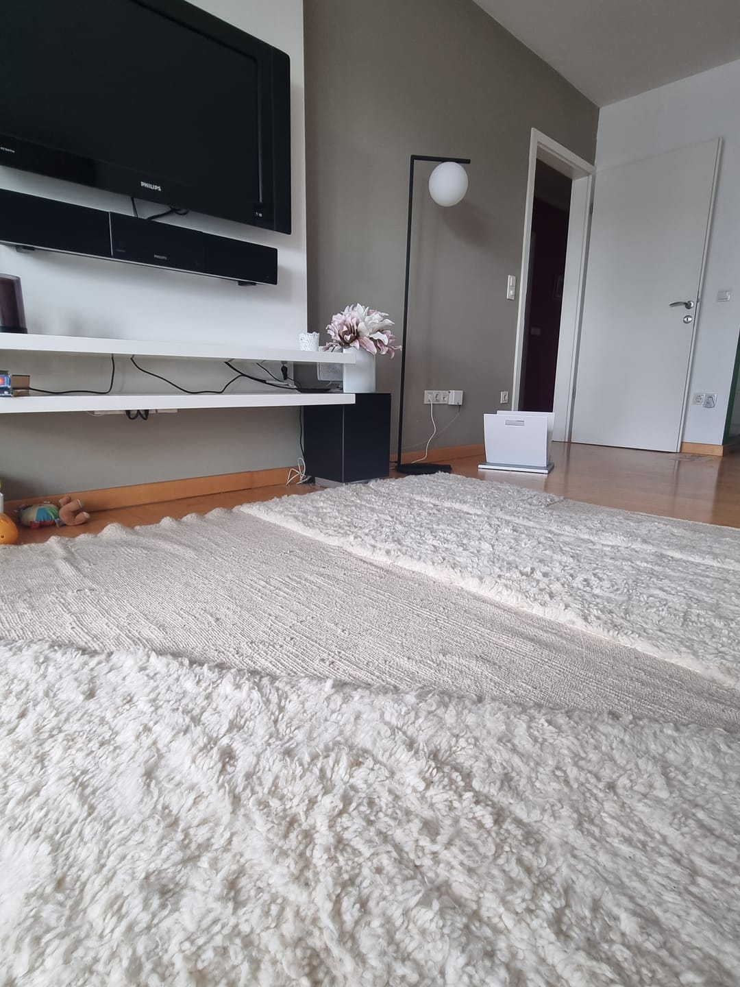 Customer photo review of Minimalist Ivory Moroccan Rug in Subtle Tone-on-Tone Design