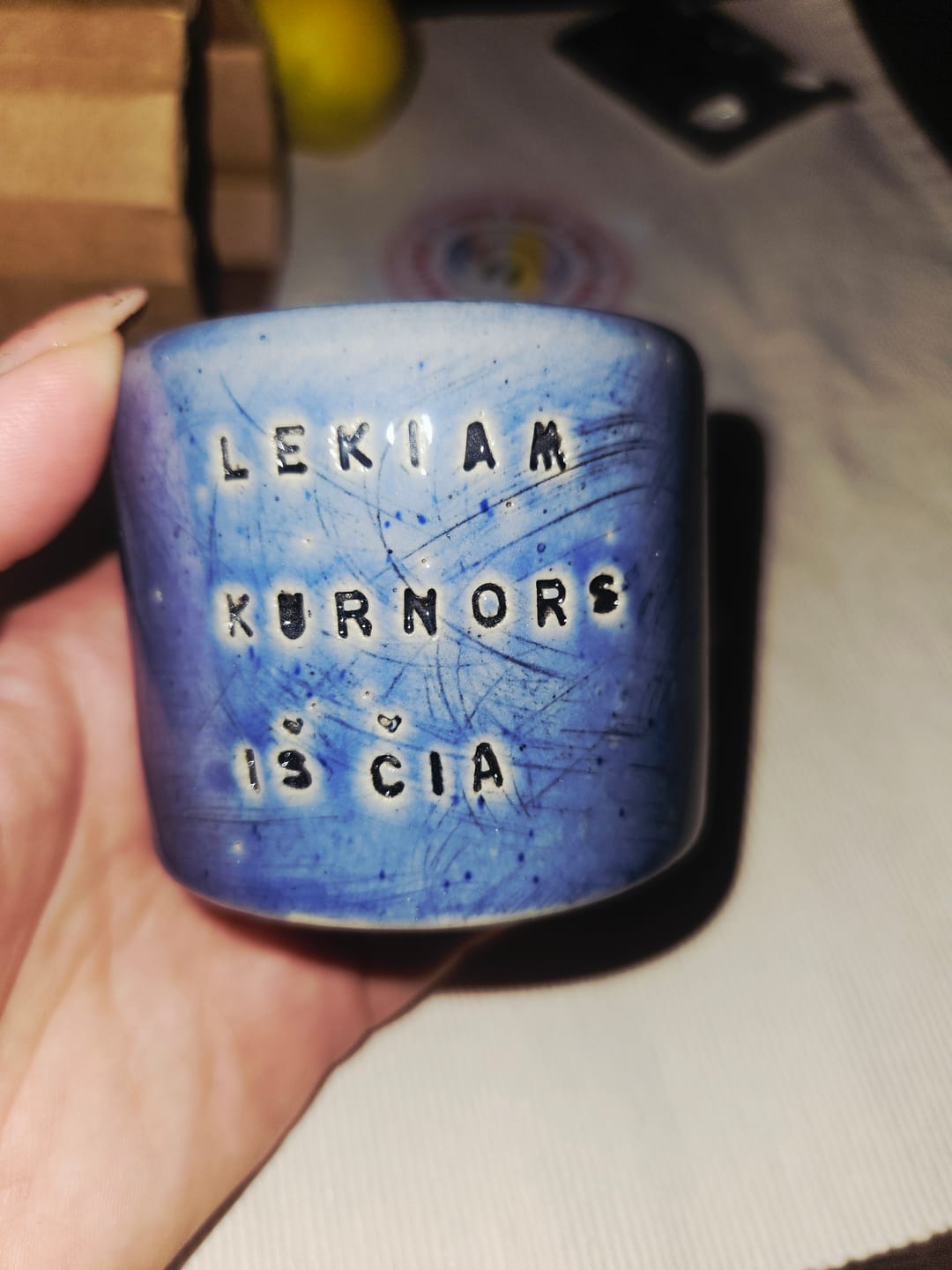 Customer photo review of Small blue tumbler mug with text in Lithuanian