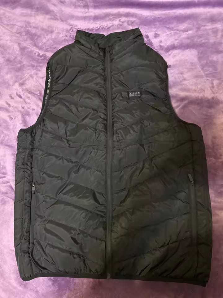 Customer photo review of Verwarmde bodywarmer met 9 verwarmingszones – ultralicht, USB-gevoed & ideaal voor outdooravonturen