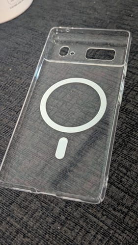 Customer's Anti Yellow Magsafe Clear Case for Google Pixel 6 lying flat on a dark surface, showing the white magnetic ring.