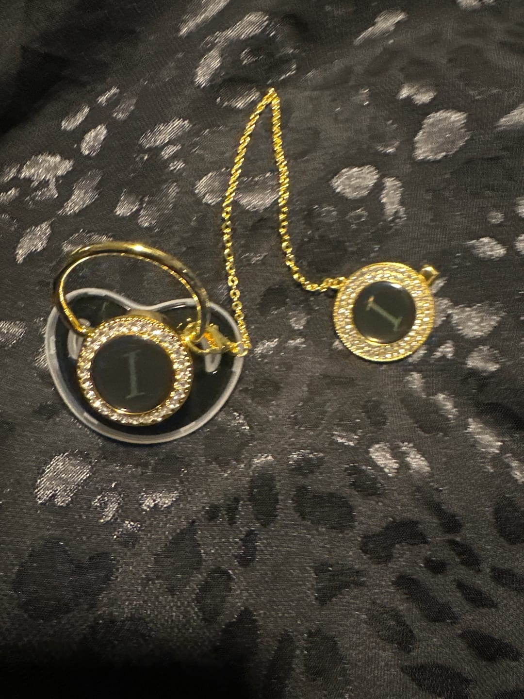 Customer photo review of Black/Gold Luxury Customized Baby Bling Pacifier