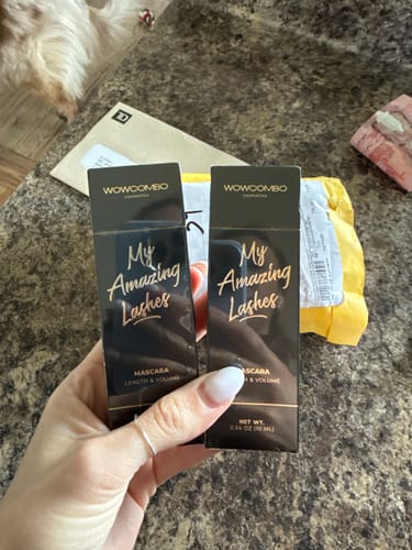 Customer holding two new boxes of My Amazing Lashes Mascara.