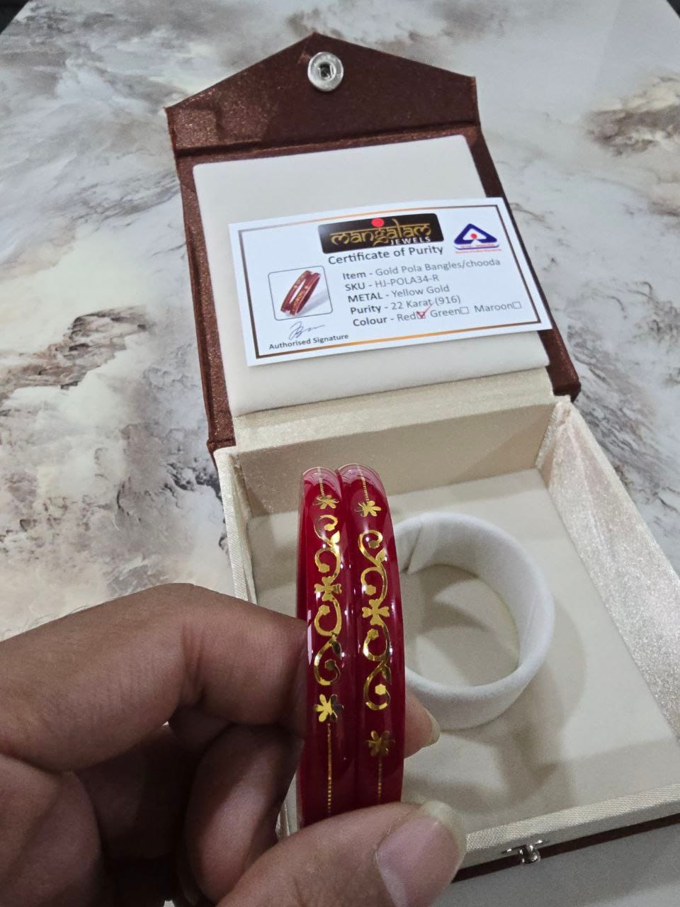 Customer photo review of 22kt (916) Yellow Gold Handmade Pola Bangles/Chooda/Churas for Women with Purity Certificate