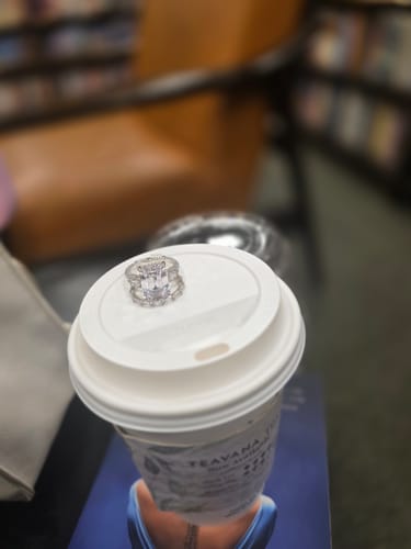 Customer photo review of Louily Unique Emerald Cut Three Stone Engagement Ring In Sterling Silver