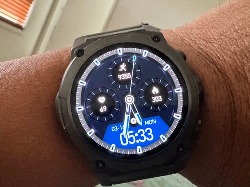 Customer's Gard Pro Ultra 3 smartwatch on their wrist, showing a digital face with blue numbers and various fitness metrics.