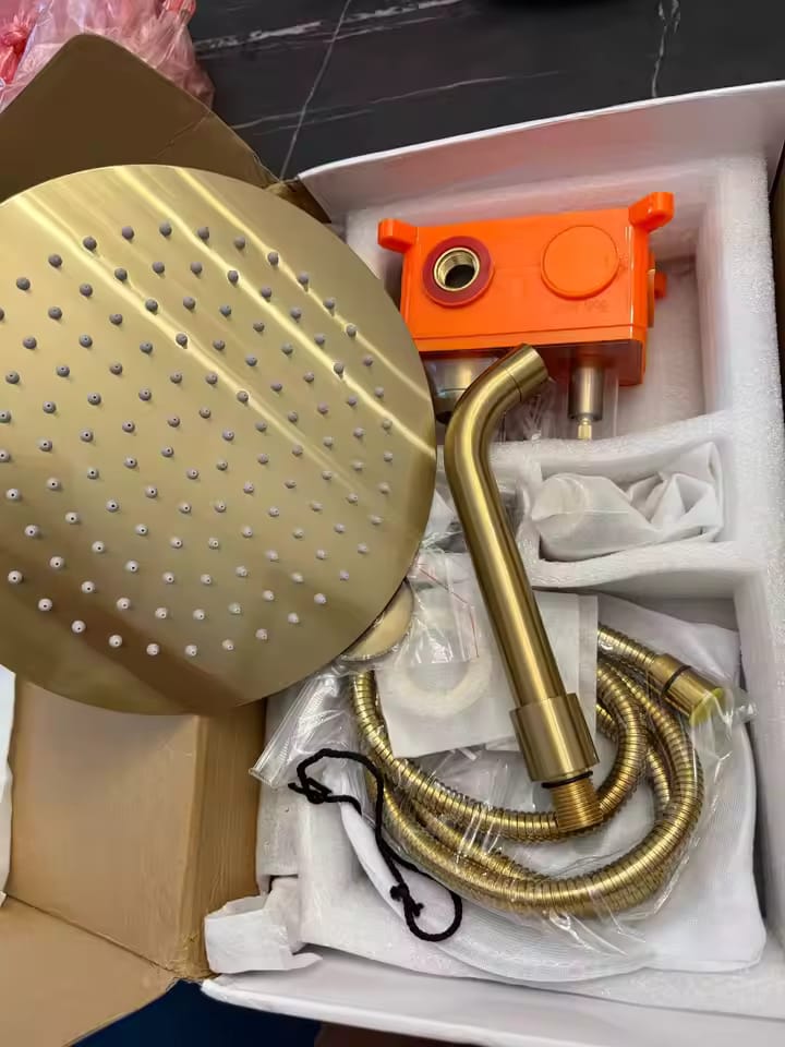 Customer photo review of Odense - Two-Way rushed Gold Shower Faucet Wall Mounted Big Rainfall Head Hand Sprayer Bathtub Mixer Set