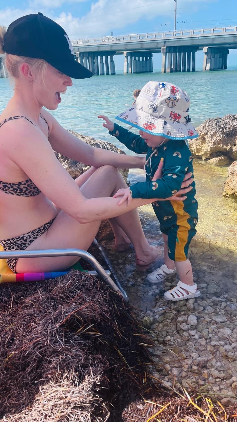 Customer photo review of Teal Rainbows UPF 50 Recycled Sunsafe Sunsuit