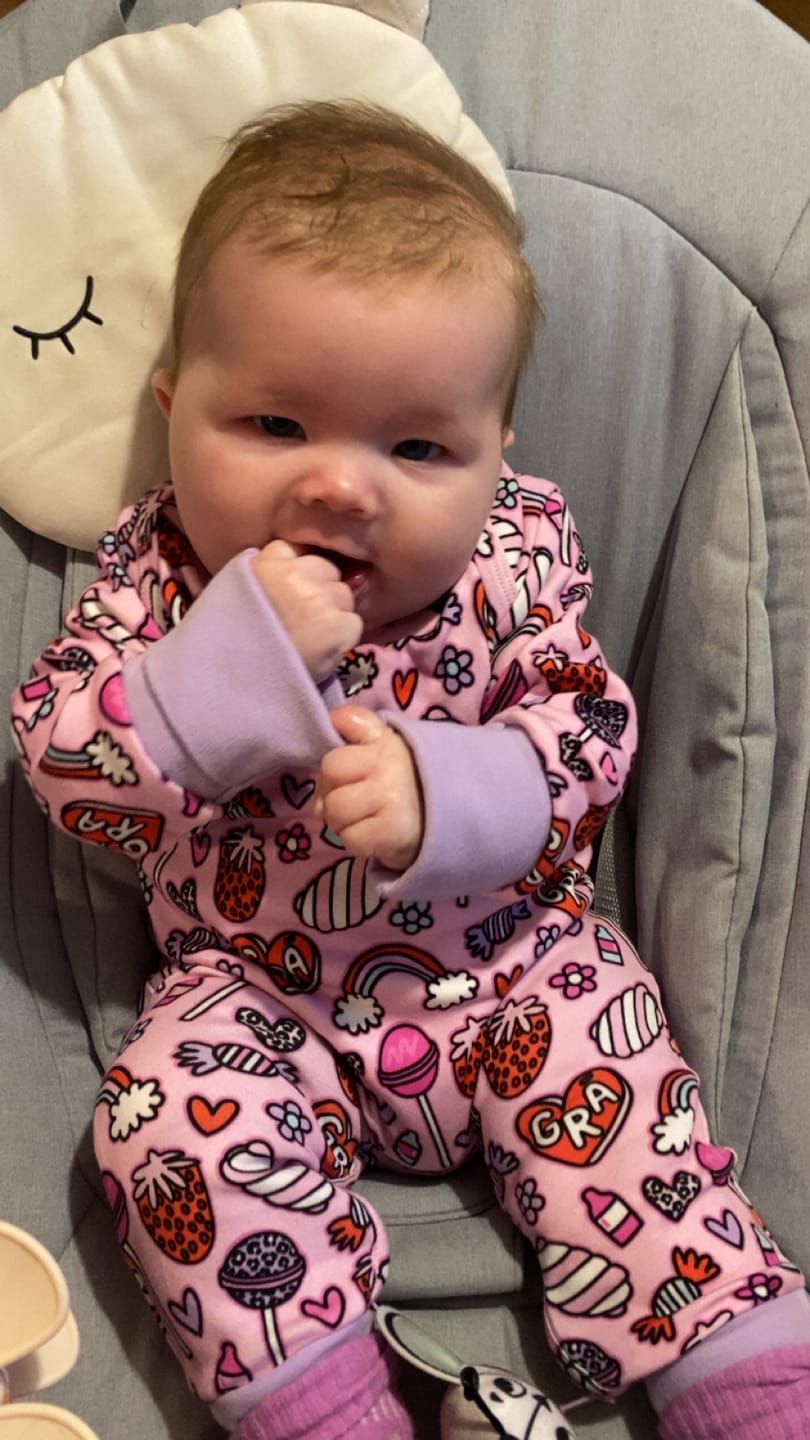Customer photo review of Grá Onesie