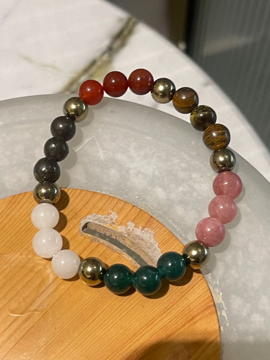 Customer photo review of Dhan Vriddhi Crystal Bracelet – Vastu Remedy for Wealth Attraction | Prosperity Energy Activator | 8 mm Beads