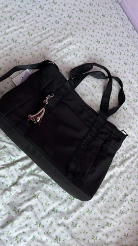 Reseña con foto de un cliente sobre Bolso Nylon Llavero Street