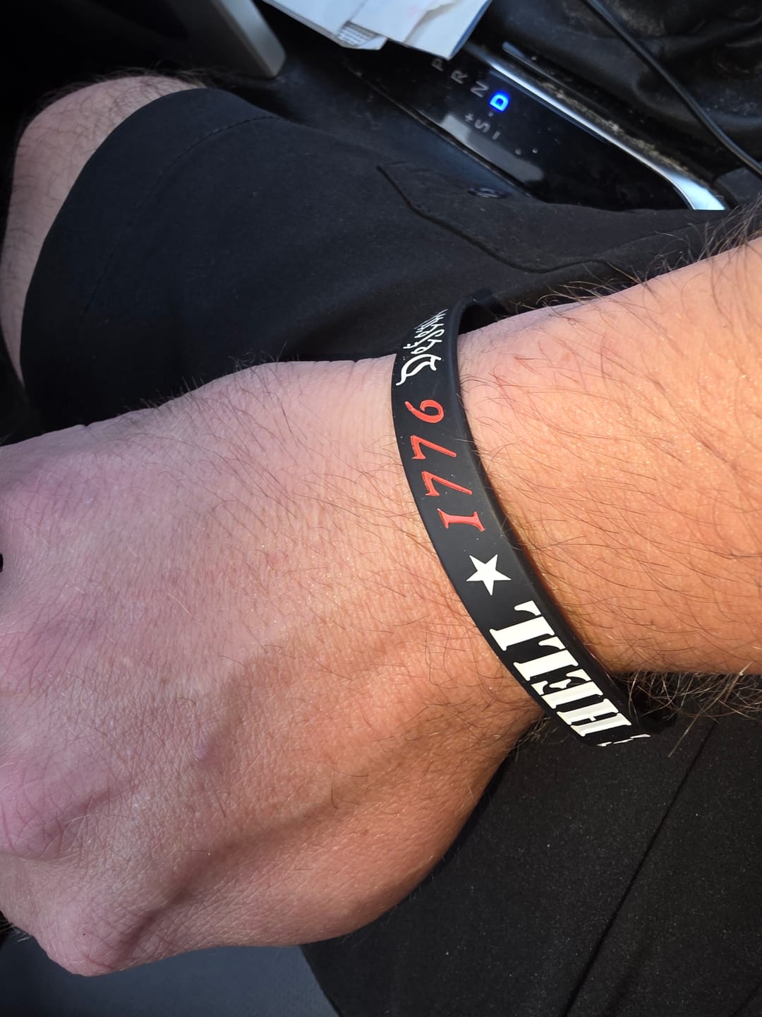 Customer photo review of Fight Like Hell Wristbands