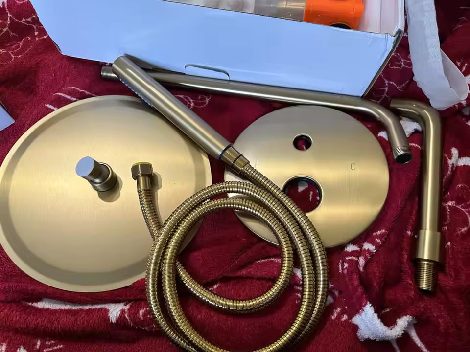 Customer photo review of Odense - Two-Way rushed Gold Shower Faucet Wall Mounted Big Rainfall Head Hand Sprayer Bathtub Mixer Set