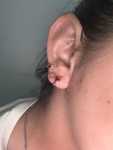 Customer photo review of Piercing Trebol Hueco