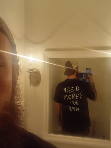 Customer photo review of NEED MONEY TEE