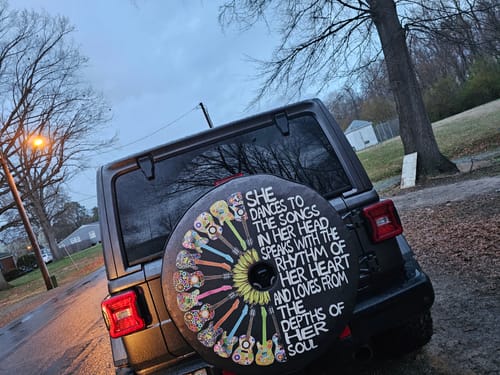 Customer photo review of She Dances to The Songs in Her Head + Guitars & Sunflower Spare Tire Cover