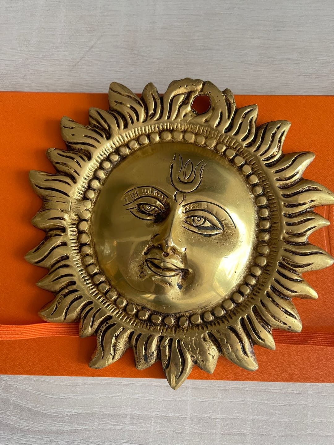 Customer photo review of Brass Vastu Sun Wall Hanging Idol Vastu Remedy for East Direction Balance, Fame and Positive Energy for Home, Office and Entrance Decor | 15 x 15 cm | 800 g