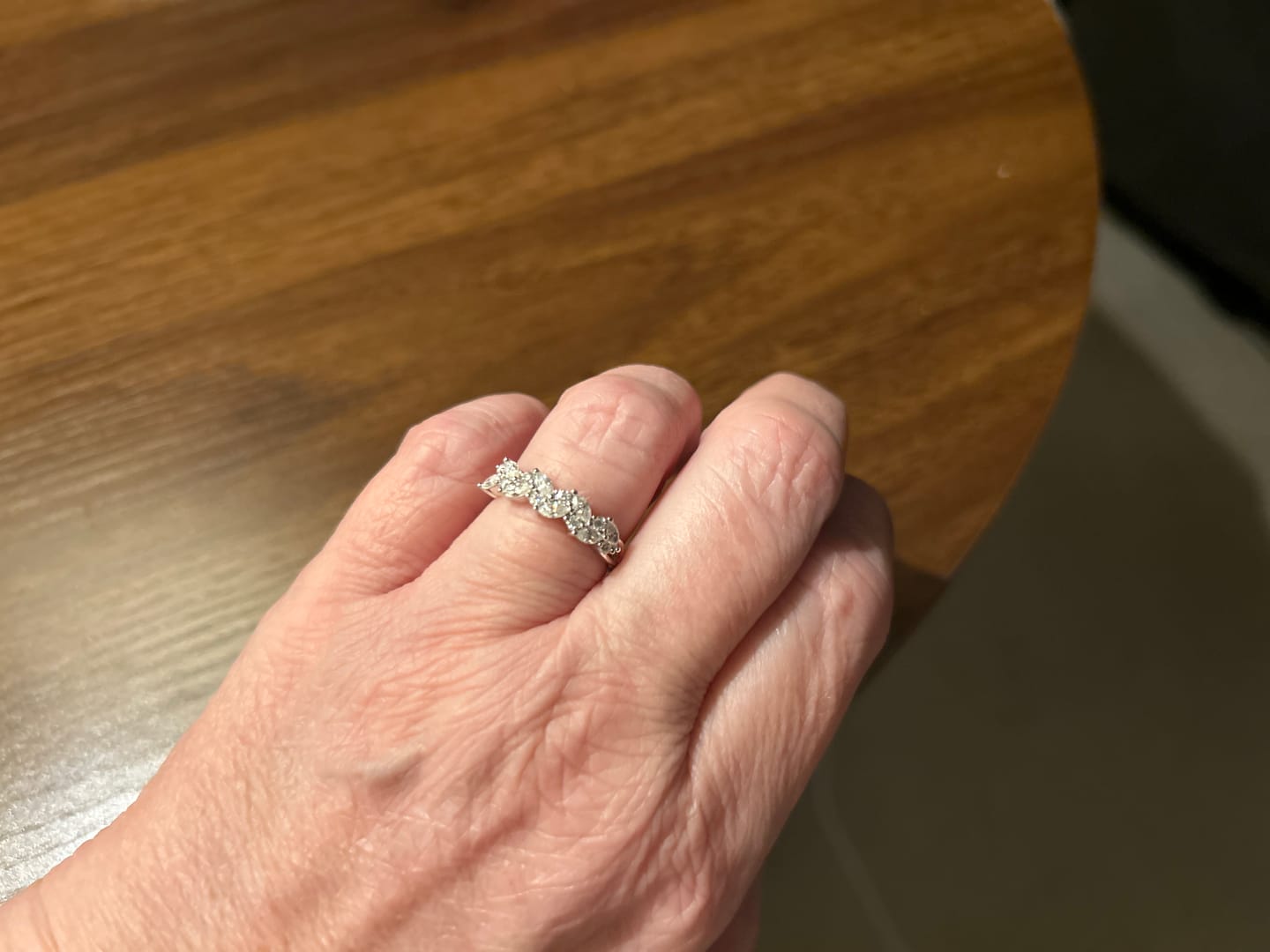 Customer photo review of Alternating Marquise And Round Moissanite Half Eternity Wedding Band
